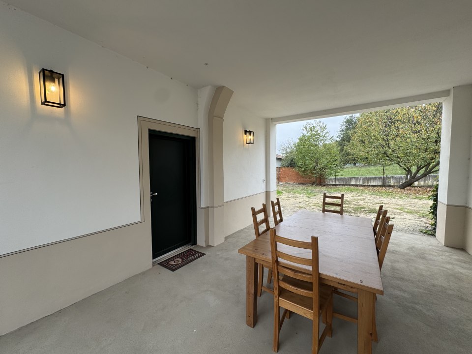 The entrance into the annex with a covered dining area