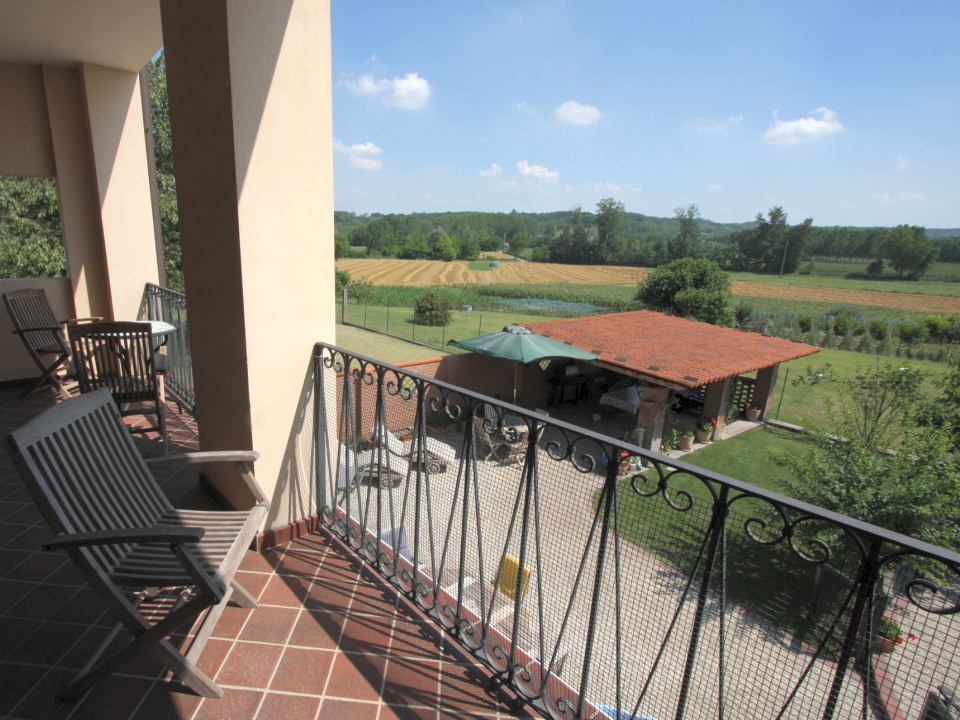 The furnished balcony on the first floor of the villa